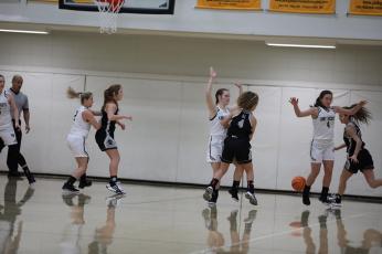 Photo by Kelli Graves / Clay County Progress: Lady Jackets pair off with Robbinsville while orchestrating a rally.