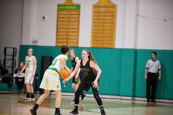 (Kelli Graves • Clay County Progress) Brianna Foster prepares to stop an Alleghany scoring attempt.