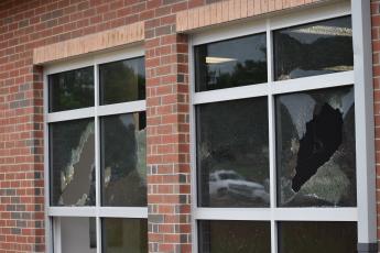 (Becky Long / Clay County Progress) Workers arrived at the Hayesville Primary School Tuesday morning to find multiple broken windows on the new Building.