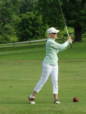 Submitted • Clay County Progress Barbara Boswell, longtime member of the league, shows off great form which allows her to hit straight down the fairway. 