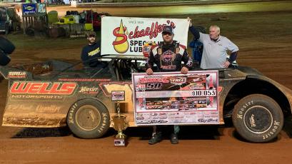 Brandon Overton stands in victory lane after winning his second consecutive “Tarheel 50.” (Cole Perkins • Photo submitted)