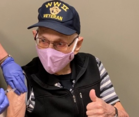 World War II veteran Ash Rothlein receives his second Moderna vaccination at the Clay County Health Department on Thursday. Rothlein, 96, is a recipient of the French Legion of Honor. He has dedicated much of his life to honoring those who died on the beaches of Normandy