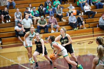 Kelli Graves • Clay County Progress Brooke Graves. No. 40 and Kaylee Leatherwood, No.31, focus on defense against Mtn. Heritage. 