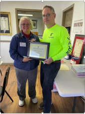 Jeanette Earle, President of the UDC Chapter, of Blairsville, presents a Certificate of Appreciate to Robert Williams, Valor, of Blairsville.