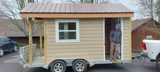Hinton Home Repair Coordinator Nick Oliver will use the new house on wheels to teach basic tips on safe and healthy home repairs and maintenance. The mobile teaching unit was constructed by Oliver and Hinton Community Engagement Coordinator Ricky Hill.