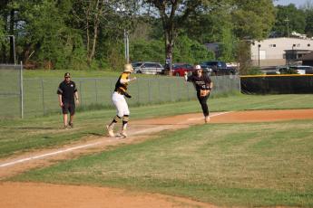 Rebecca Hall• Clay County Progress Caden Hall running down a Murphy player in a pickle.