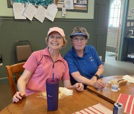 Two of the golf winners are Linda Robinson and Martha Barker.