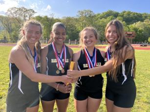 The 4x400 and 4x800 Meter Relay Team are from left, Emma Shook, Marley Espinal, Lila Roberts and Alyssa Rodd.