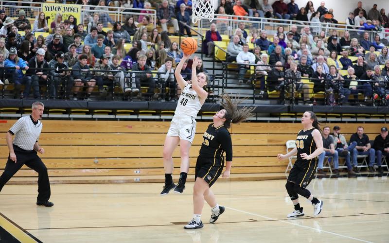 Kelli Graves • Clay County Progress Kynnly McClure attacks the basket as the Lady Jackets try to rally against the No.1 team in the state.