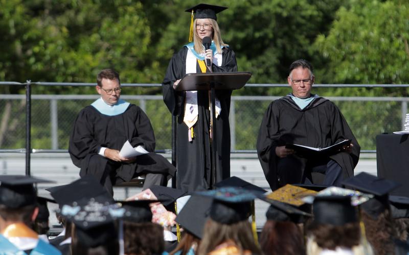 Honor graduate speaker Reagan Bunch addresses her classmates during graduation on Friday, June 4 at Hayesville High School.