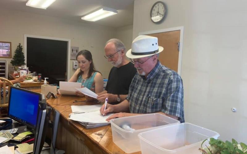 Joe Slaton (middle) files for Mayor of Hayesville. Lauren Tiger and Harry Baughn file for Town Council.