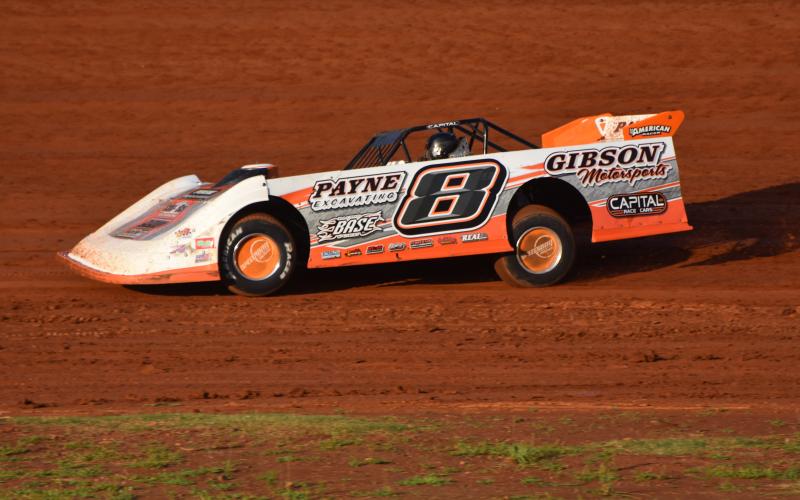 Travis Dockery • Clay County Progress “The Coach” David Payne pilots his Capital racecar around Tri County Racetrack during practice. Payne would go on to win the $2,000 top prize in the night’s main event.
