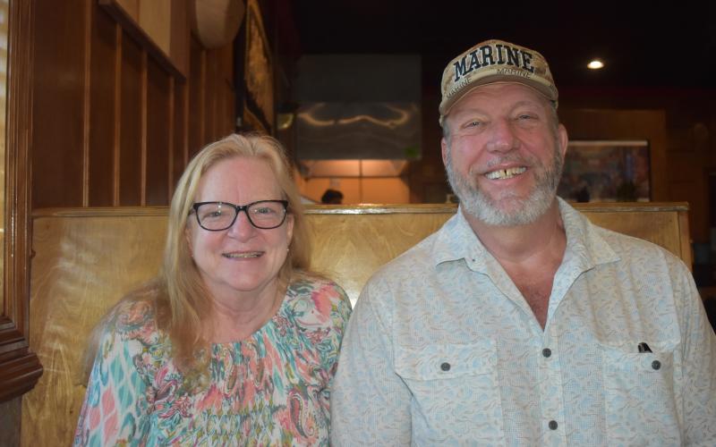 Jim and Judy McKeral, veterans of the U.S. Marine Corps, enjoy lunch            at a local restaurant and recount their years serving the country.