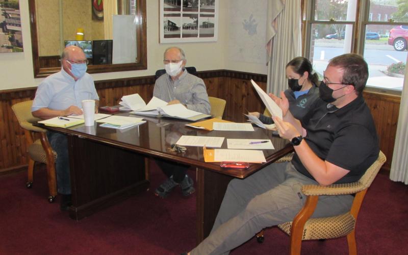 Lorrie Ross • Clay County Progress Hayesville Town Council gets down to business at Monday evening’s meeting. Council members are, from left, Mayor Harry Baughn, Councilman Joe Slaton, Councilwoman Lauren Tiger and Councilman Austin Hedden.
