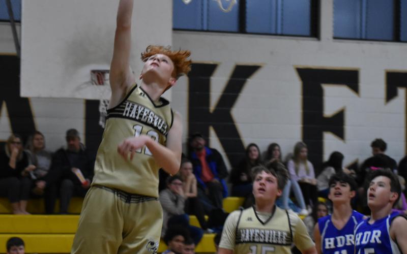 Payton Mcgaha sails to the basket for two points.
