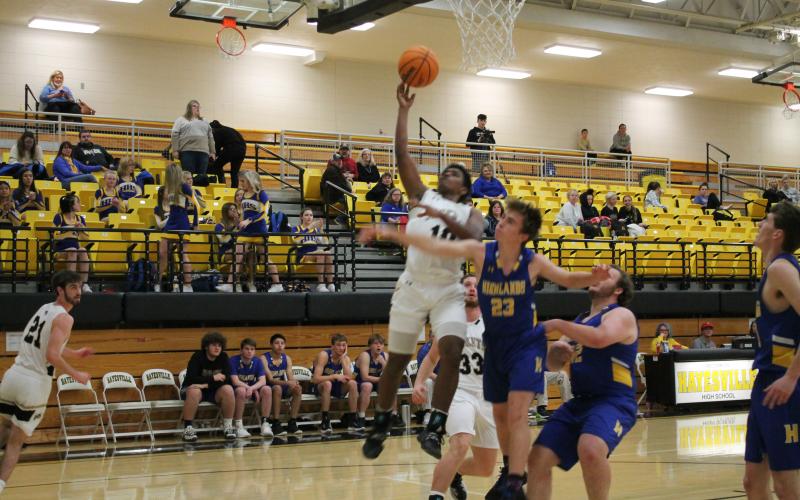 (Deby Jo Ferguson • Clay County Progress) Asher Brown goes up for 2 of his 14 points in first two quarters of game against Highlands. 