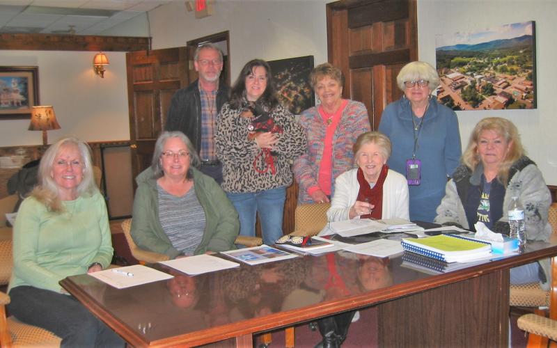 Historic Hayesville Inc. volunteers are, from left, Valerie Dayton, Mary Harrington, Stu Jenner, Misti Muscat, Carleen Brock, Joy Fox, Helga Reaves, Marie Thompson and Mil Puglisi, not shown, met on Wednesday, Feb. 9 to finalize events and annual plans approved earlier by the HHI Board of Directors.