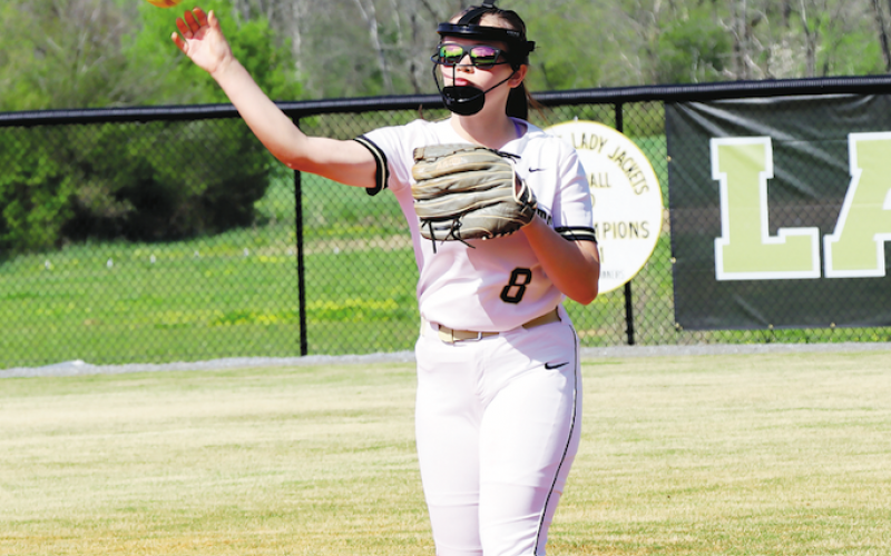 Deby Jo Ferguson • Clay County Progress  Addie Bunch is hot on the batter’s bag for the Lady Jackets. 
