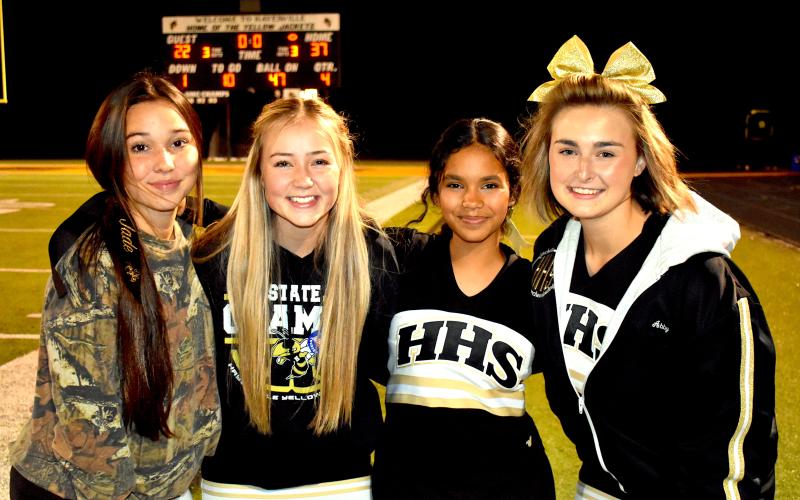 Gary Corsair • Clay County Progress Hayesville cheerleaders (from left) Jade Price, Chloe Price, Bella Duran and Abby Joyce bask in the glow of the Yellow Jackets first-round playoff victory.