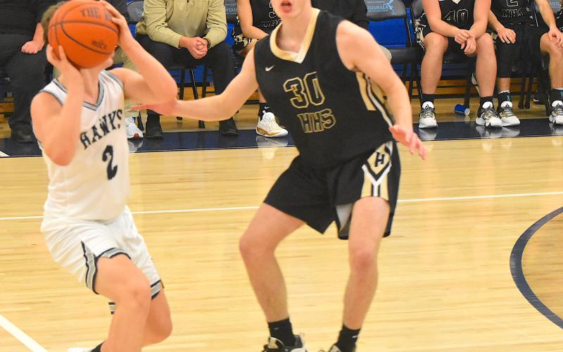 Gary Corsair • Clay County Progress Hayesville's Slade Crouch, No. 30, applies pressure as Nantahala tries to get its offense started.
