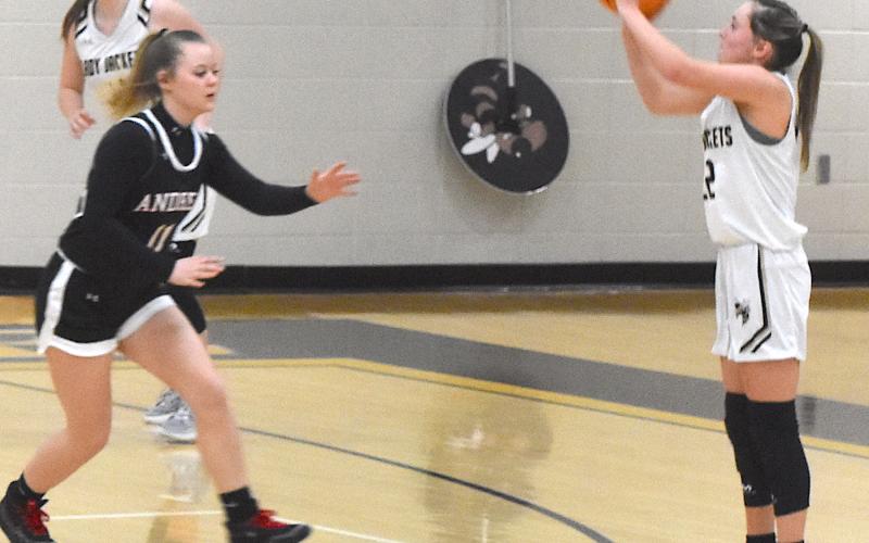 Gary Corsair • Clay County Progress Lady Yellow Jacket Emma Ashe bombs away from 3 point land in Hayesville's convincing win over Andrews.