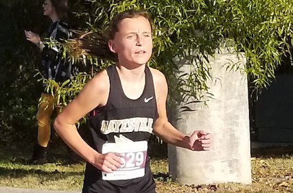 (Travis Dockery • Clay County Progress) Emma Ashe powers ahead on her way to an eighth place finish.