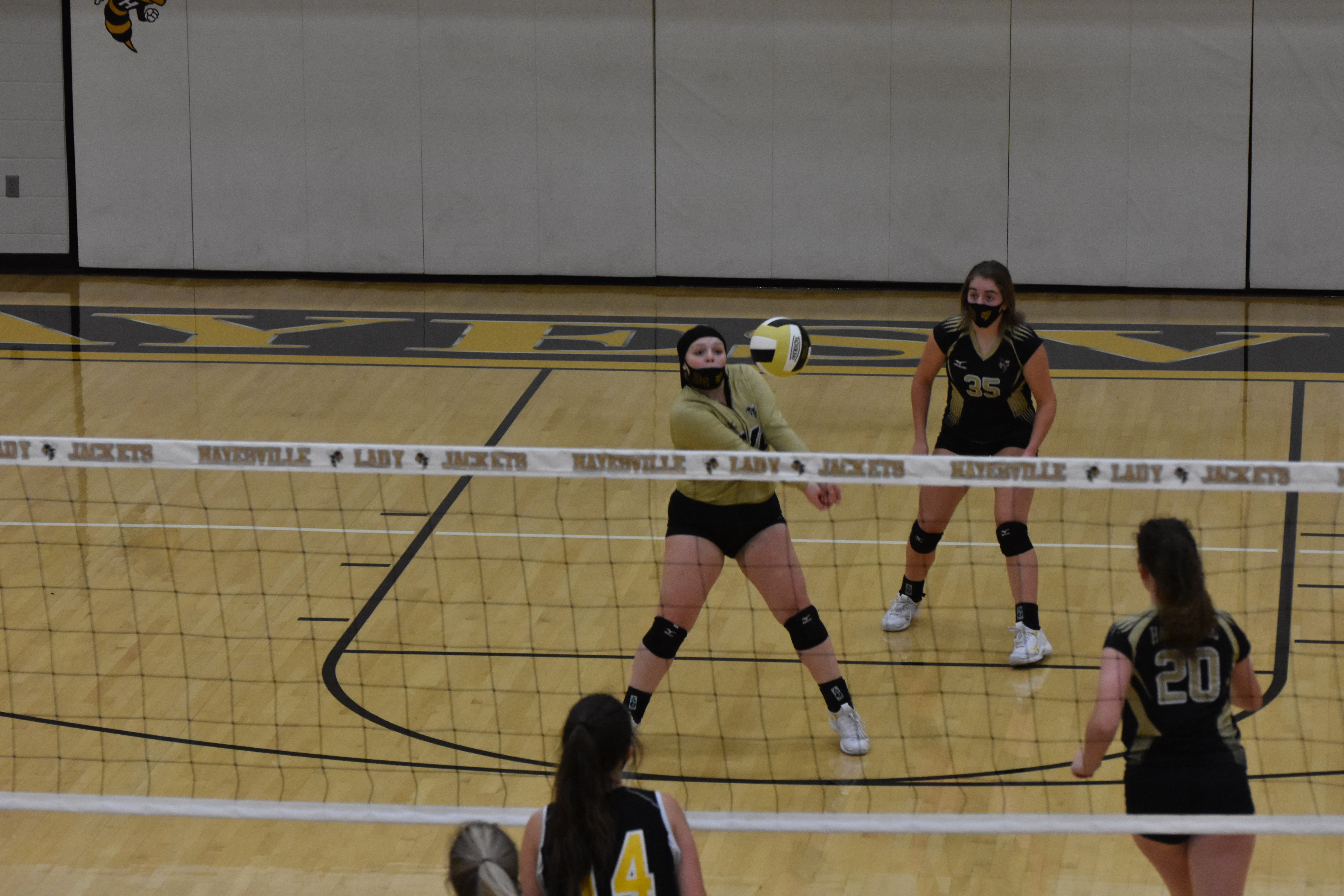 Gracie Perry handles a hot shot to the back row to start a potential scoring opportunity for the JV Lady Jackets against Murphy.