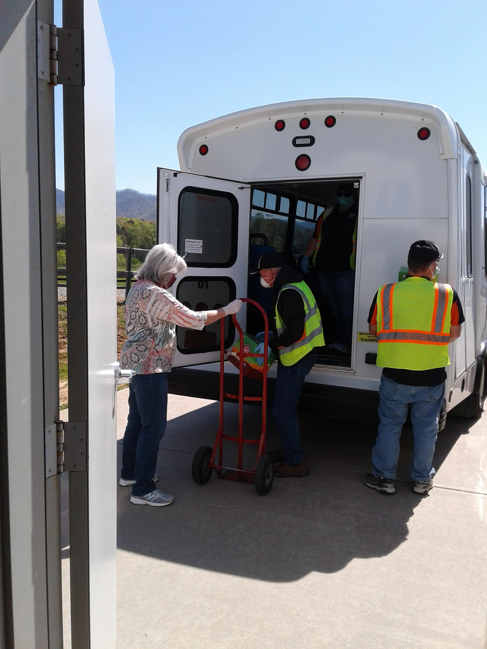 Sharon Hayden gives food boxes to Clay County Transportation Department. CCT has been an important partner to both Matt's Ministry and the Clay County Food Pantry because the buses deliver food to those who cannot drive to get their own.