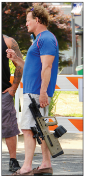 (Photo • North Georgia News) Cleveland Grover Meredith Jr. upset several Black Lives Matter protesters when he showed up to an organized demonstration with his rifle to hold a counterprotest of sorts on June 5, 2020, in Hiawassee.