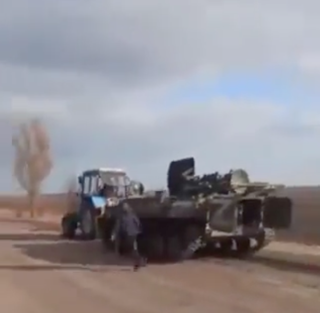 A farmer is reported to have towed away a Russian tank with his tractor.