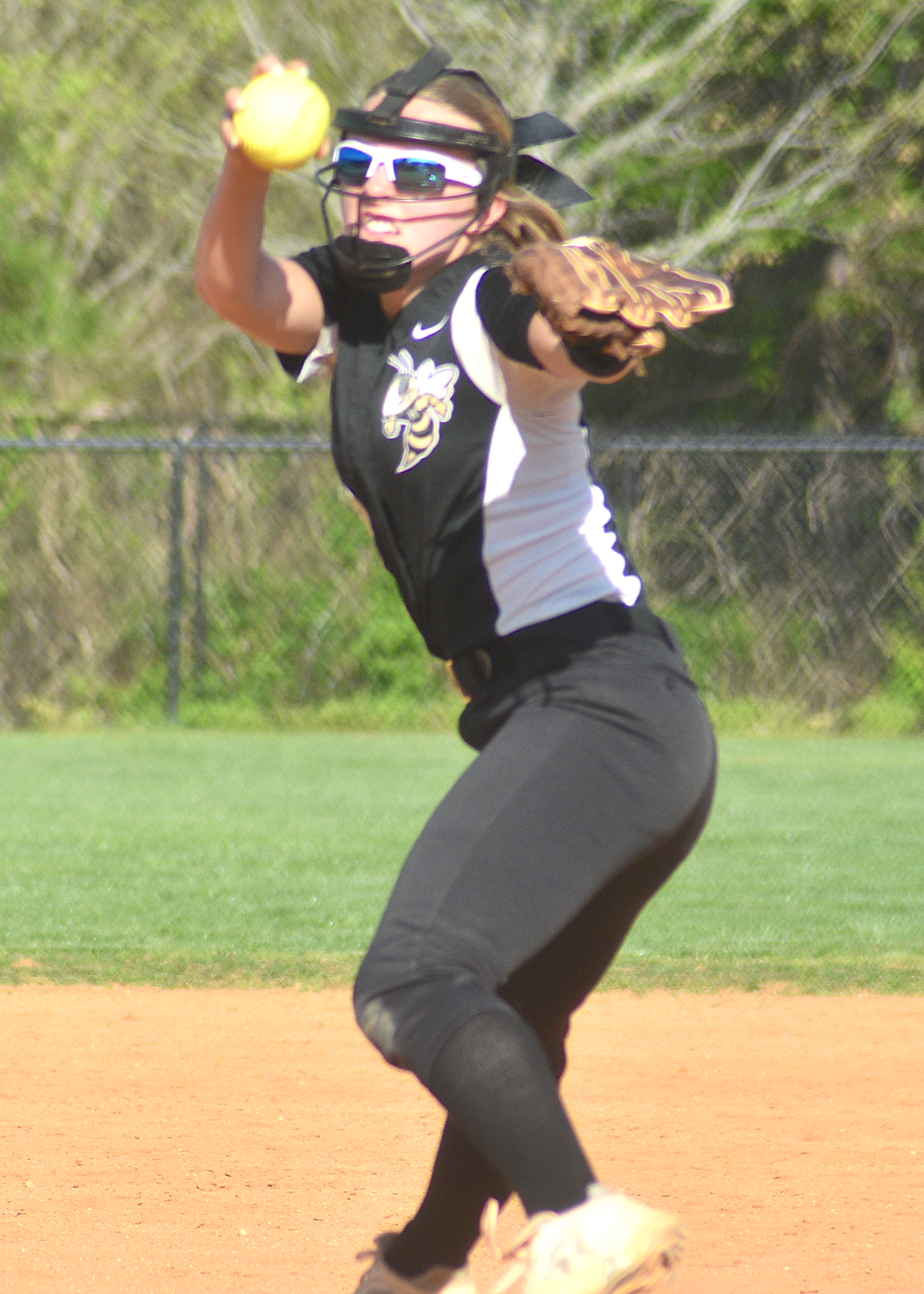 Gary Corsair • Clay County Progress Yellow Jackets ace Addie Bunch delivers a sizzler against Cherokee.