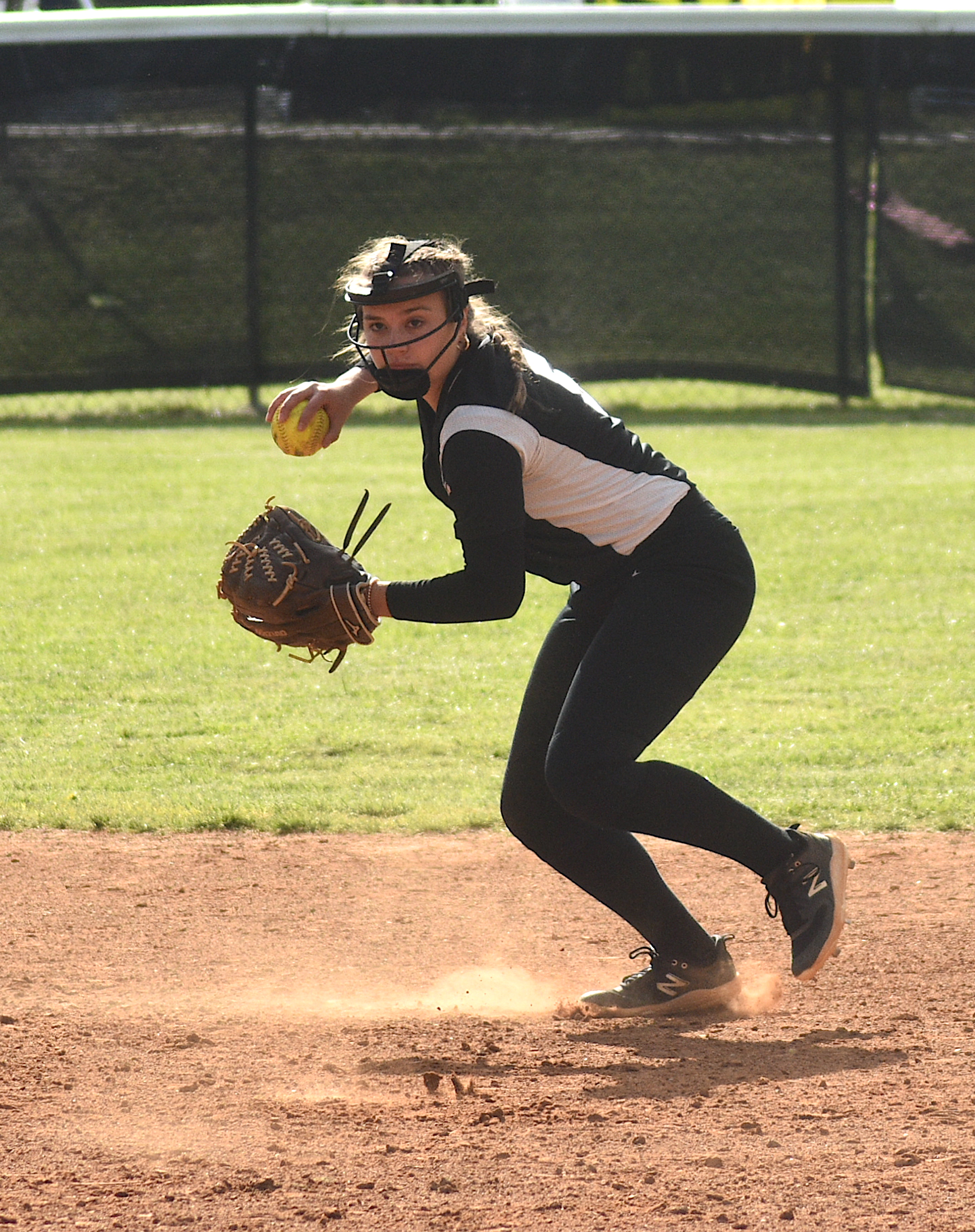 Gary Corsair •  Progress Hayesville shortstop Lila Roberts pivots after scooping up a hot grounder at  Robbinsville.