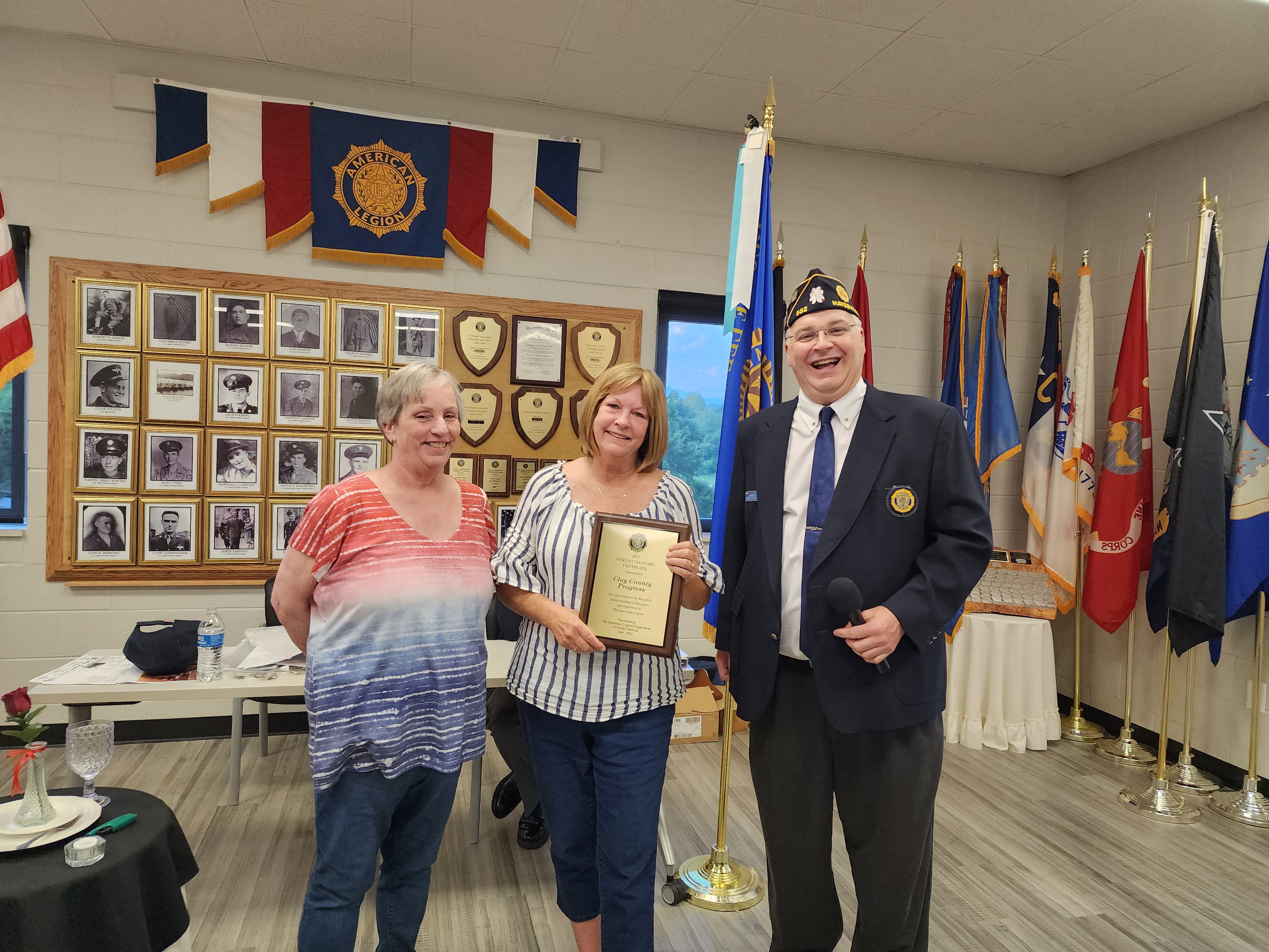 Clay County Progress Office Manager Midge Roach and Publisher Becky Long, receive the Patriotic Mass Media winner for the state of North Carolina award from Commander Robert Seibert. “This is one of the highest honors a newspaper could ever receive,” Long said of the award.