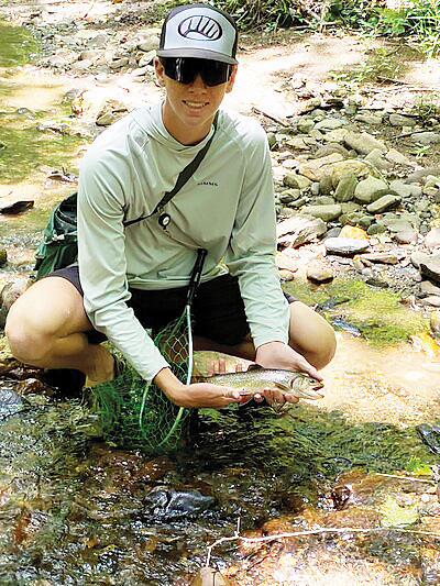 Trenton Daniel Johnson’s photo shows his love for the outdoors which his family noted in the obituary