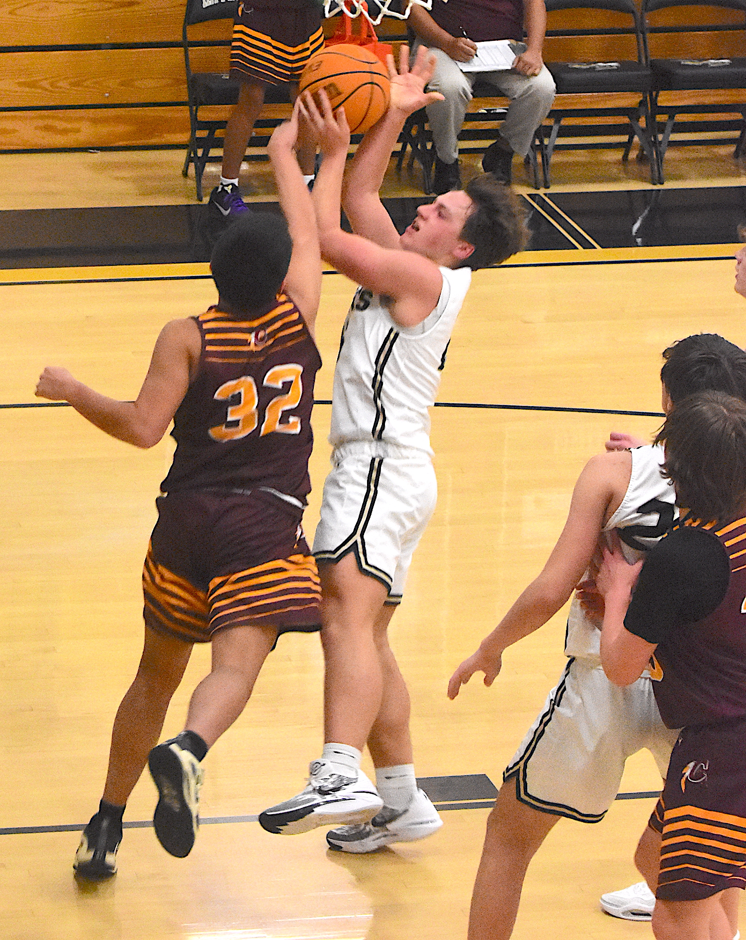 Gary Corsair • Progress Landon Trout, No. 15, wrestles a rebound away from Cherokee during Tuesday's hard fought JV game Tuesday.