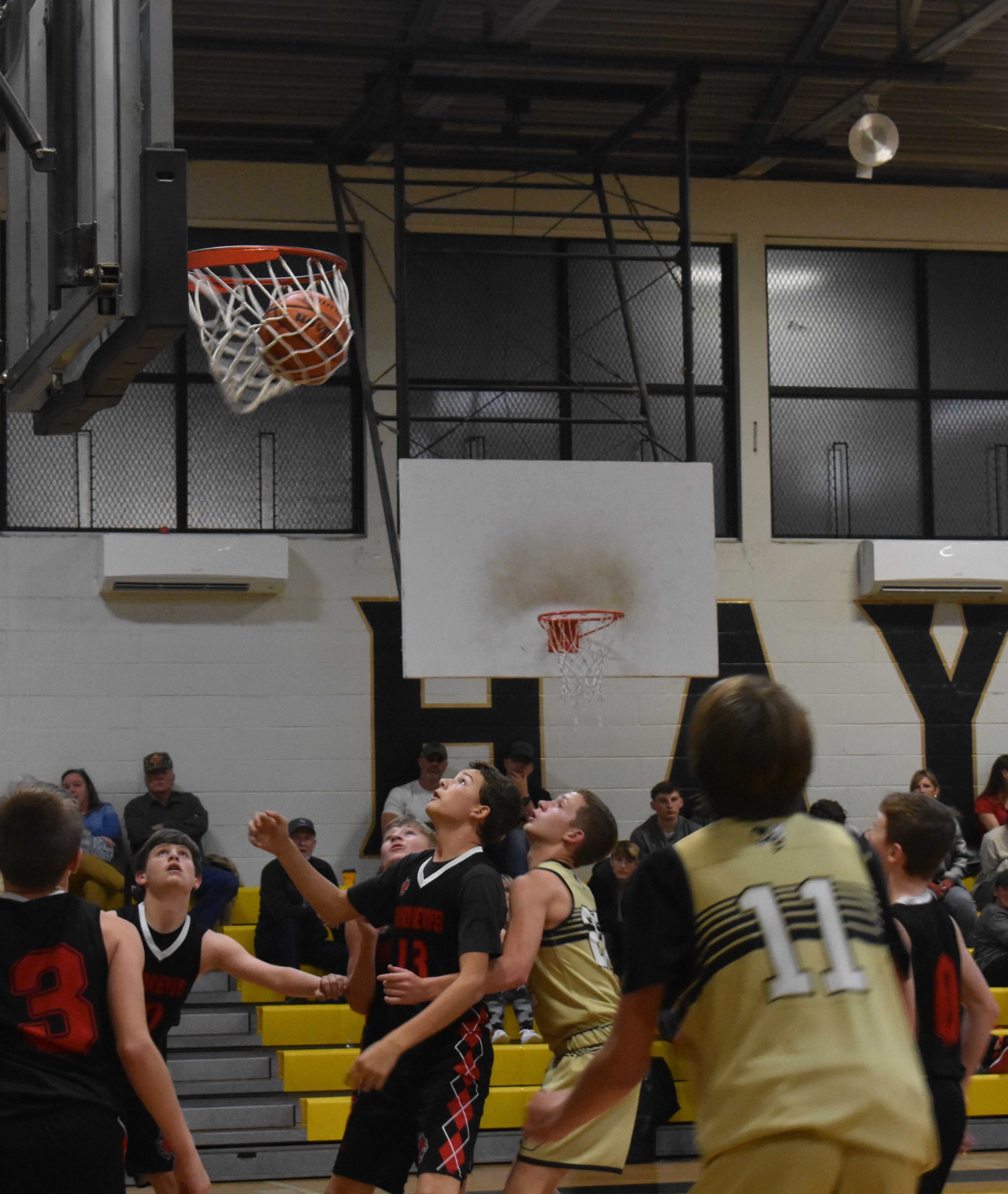 Kelce Oliver • Clay County Progress Crow Collins makes a shot.