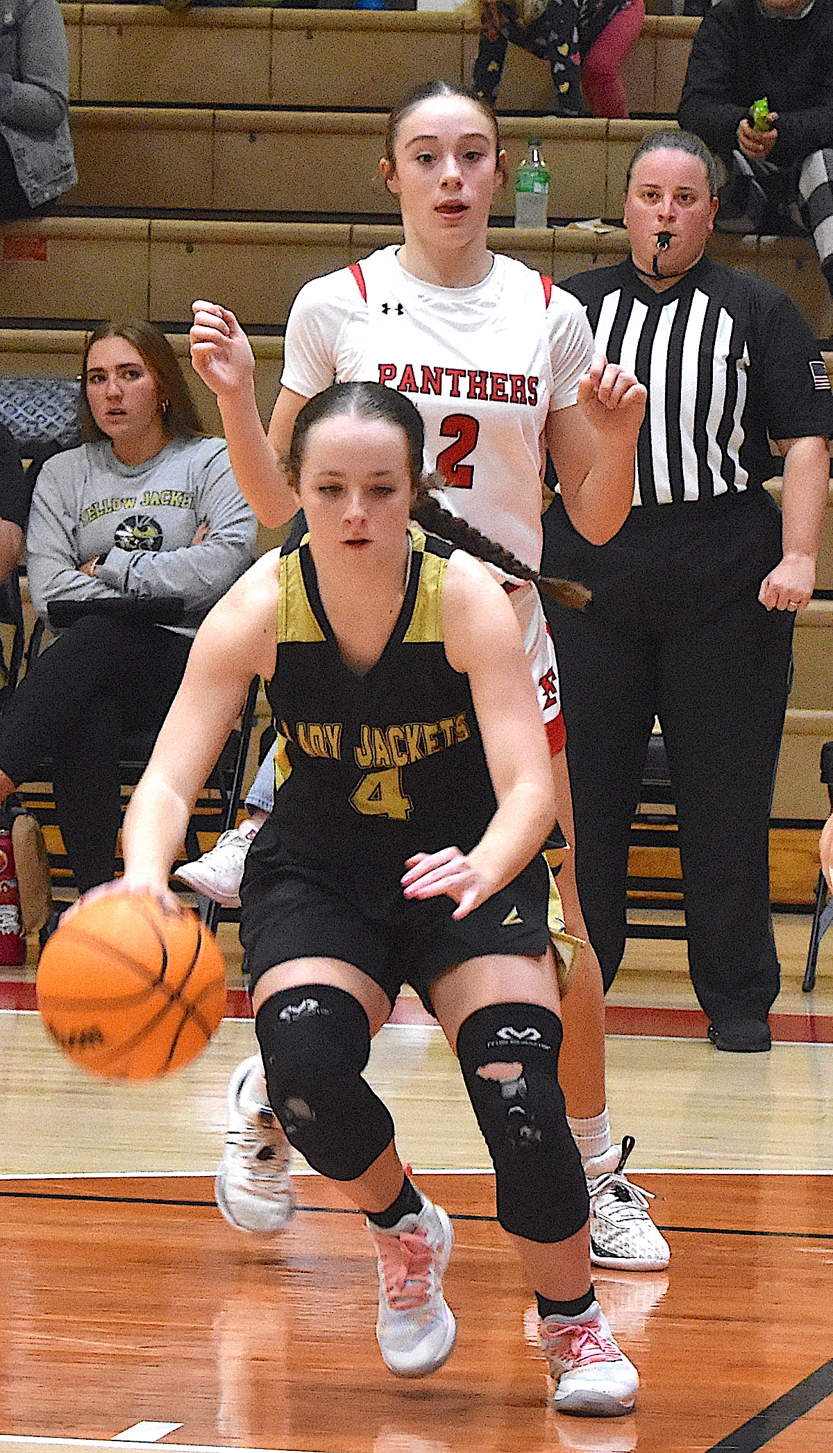 Gary Corsair • Clay County Progress Hayesville guard Breanna Abrams, No. 4, heads for the hoop after slipping past a Franklin defender.