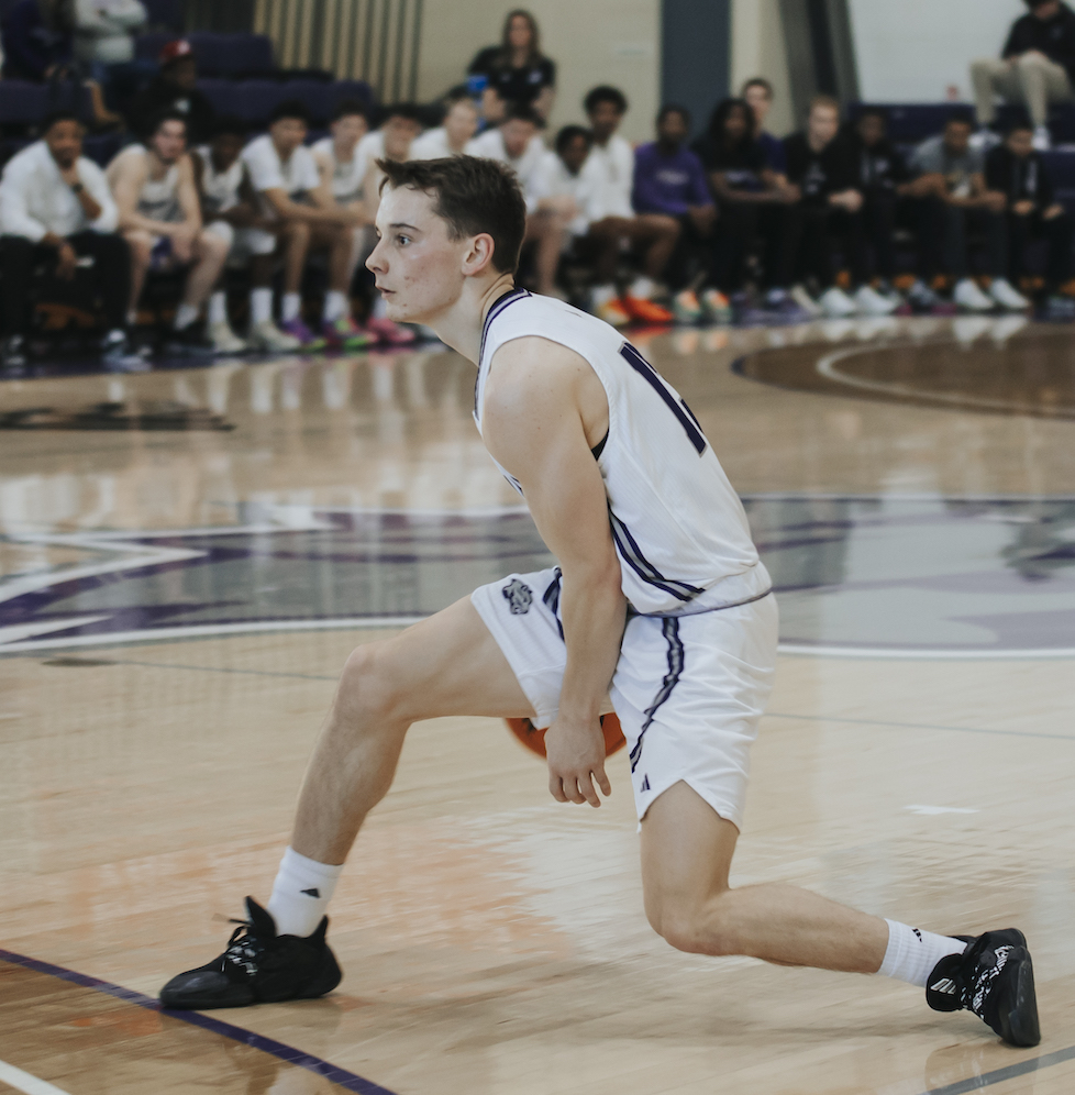 Photo provided Kolbe Ashe uses a between-the-legs dribble to get past a defender.