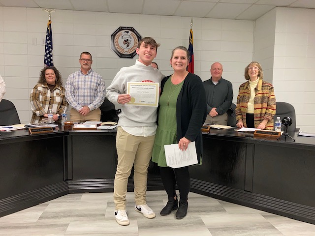 Grant Hendrix received an Honors Chorus Recognition award from the N.C. Music Educators Association. The award was presented to Hendrix by Elizabeth Moss.
