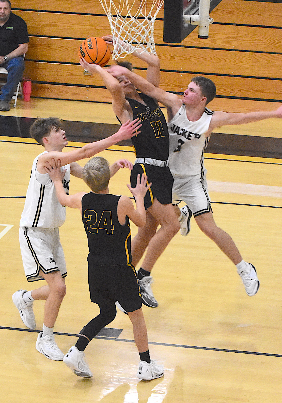 Hayesville's E.J. Abrams, No. 3, and Brandon Lynch, No. 10, discourage a Murphy field goal attempt.
