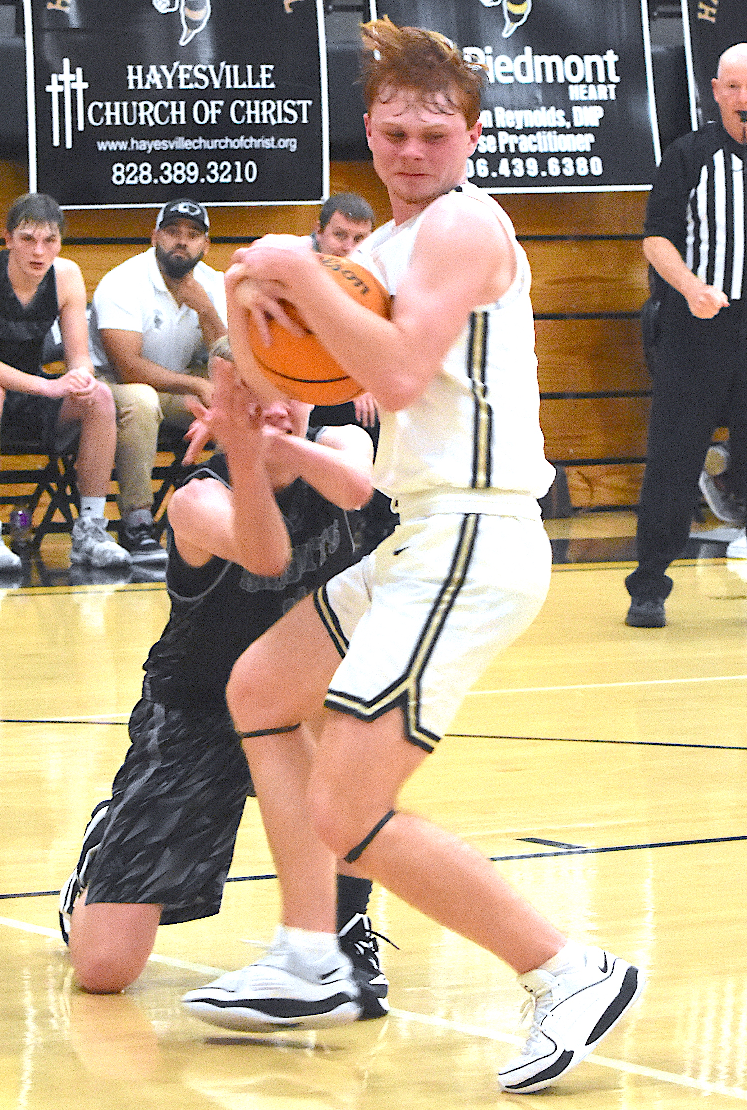 Gary Corsair • Clay County Progress Peyton McGaha rips a rebound away from a Robbinsville Black Knight.