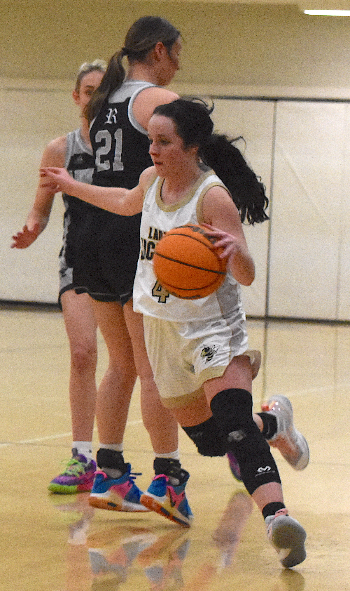 Gary Corsair • Clay County Progress Hayesville sparkplug Breanna Abrams, No. 4, winds her way through Robbinsville traffic.