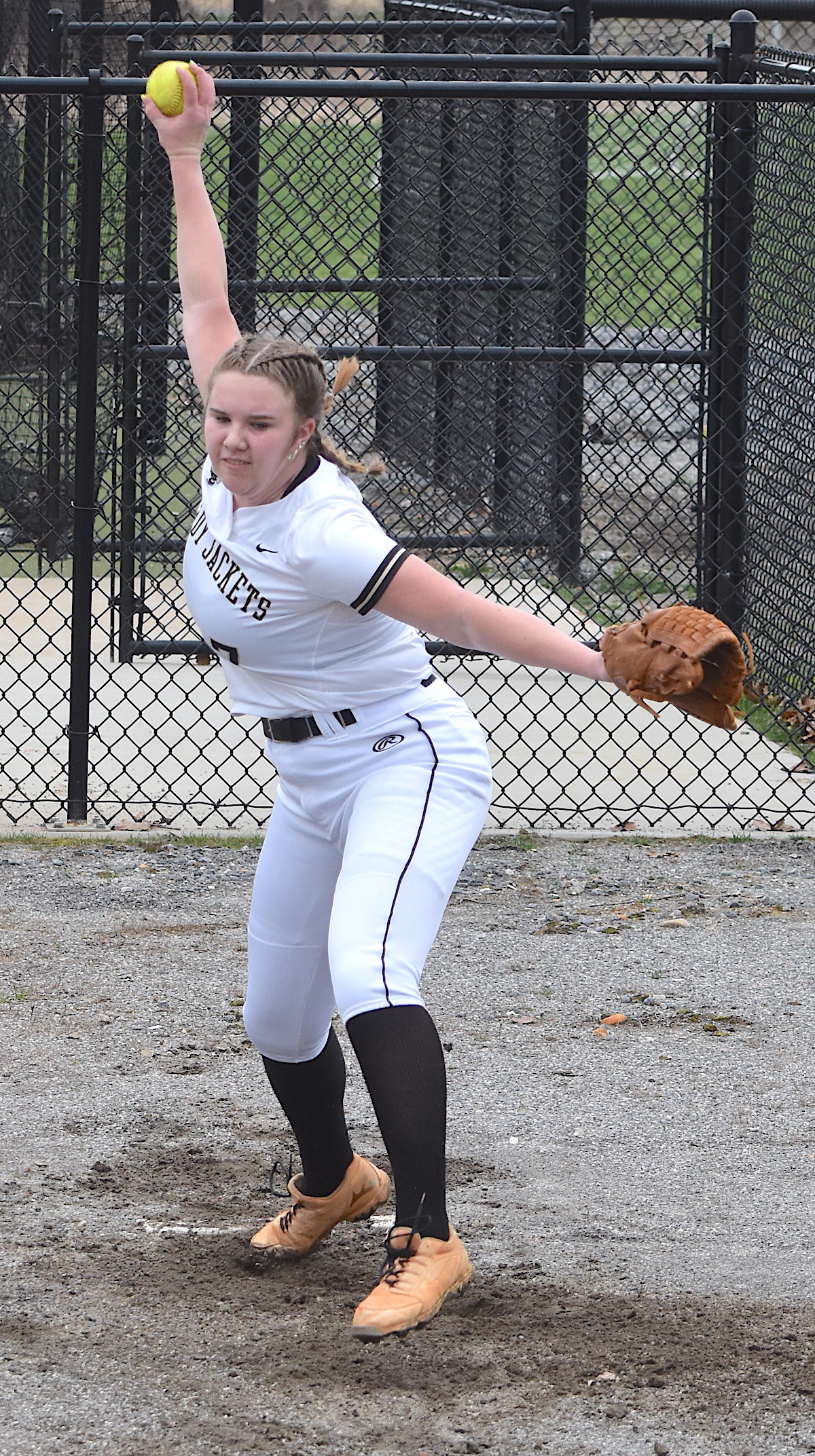 Gary Corsair • Clay County Progress Hayesville mound ace Mallory Peck throws heat during a recent warm-up. The Yellow Jacket hurler pitched well and fielded her position flawlessly in a 14-9 loss to Smoky Mountain.