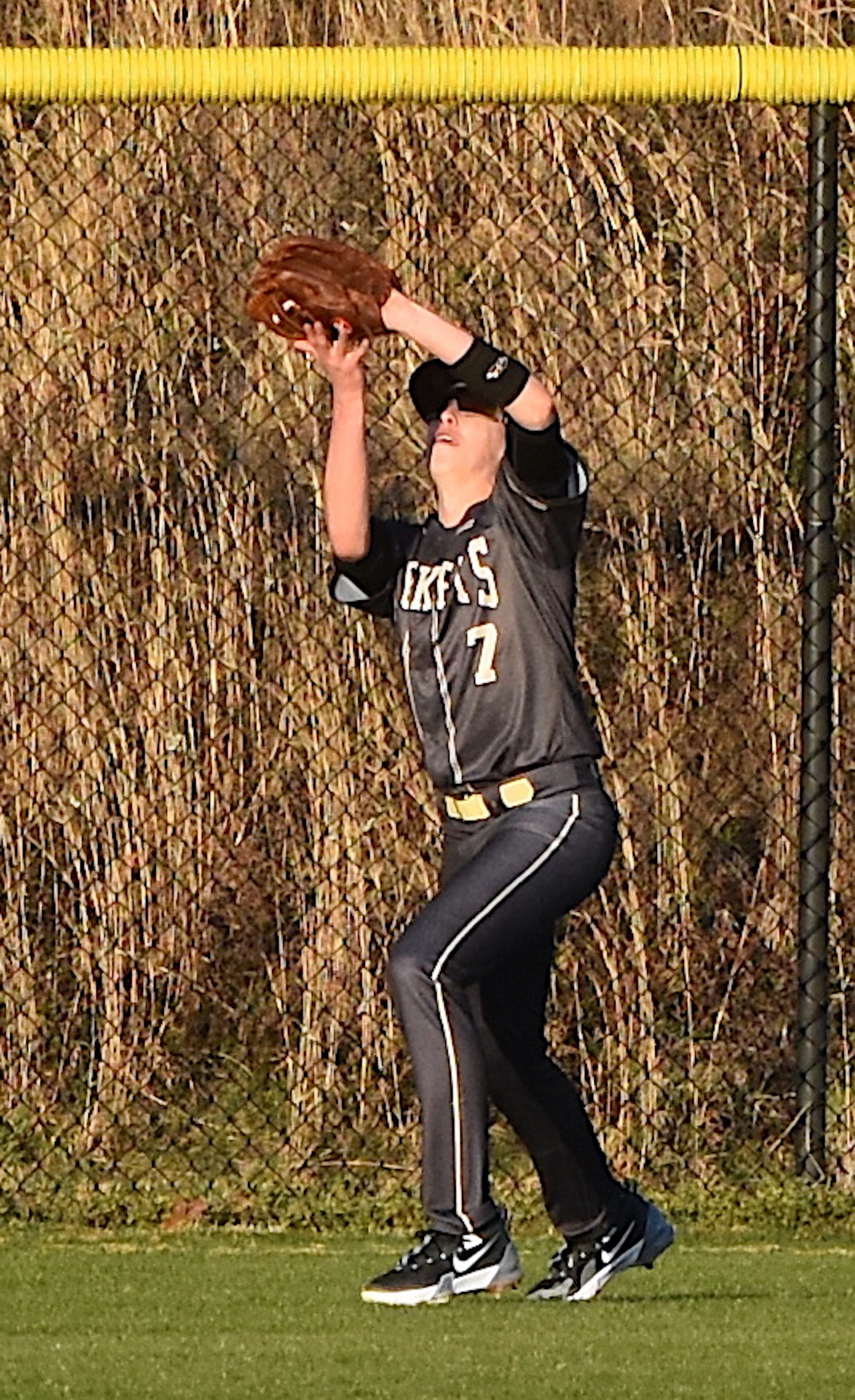 Gary Corsair • Clay County Progress Hayesville left field Cade Caruso gathers in a high fly for one of five putouts he recorded Monday at Union County.