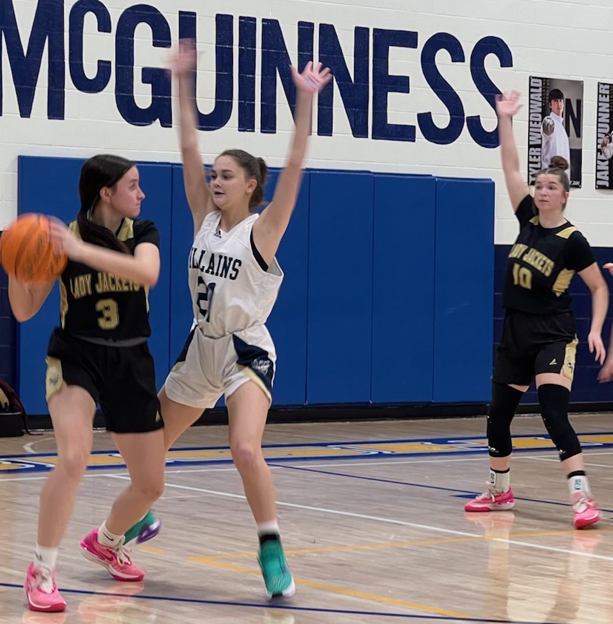 Photo by Beth Chandler Hayesville's Jasmine Brooks, No. 3, looks for a way to get a pass to Bryleigh Krieger, No. 10, in the low post.