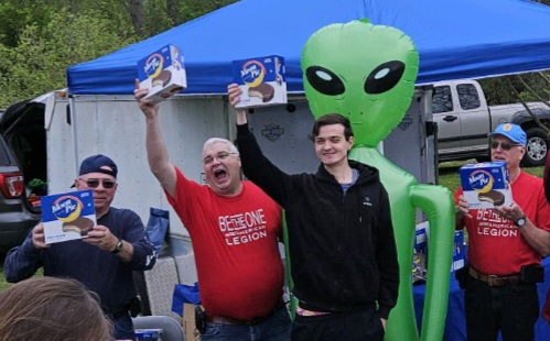 Mitchell Shields, Robert Seibert and Phil Cantley congratulate Luke Weigold, center, on winning the Moon Pie eating contest.
