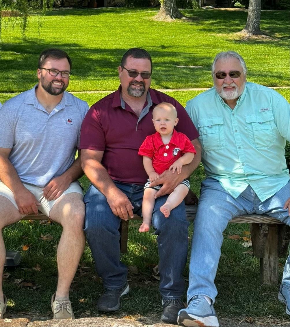 The winning photo in the Clay County Progress Look-A-Like Father-Son contest