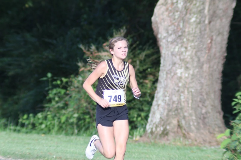 Makenna Moss finishes in 2nd place for the Lady Jackets.
