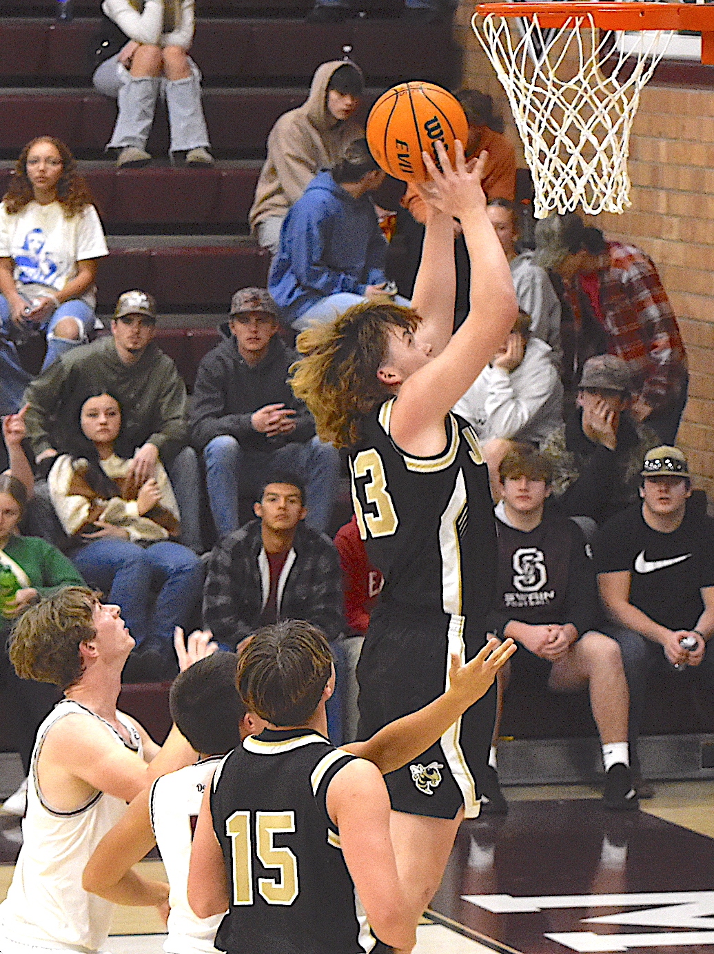 Gary Corsair • Clay County Progress Hayesville’s Jackson Sellers, No. 33, goes up strong for 2 against Swain. Sellers tallied 13 in the Yellow Jackets’ win over Hiwassee Dam.