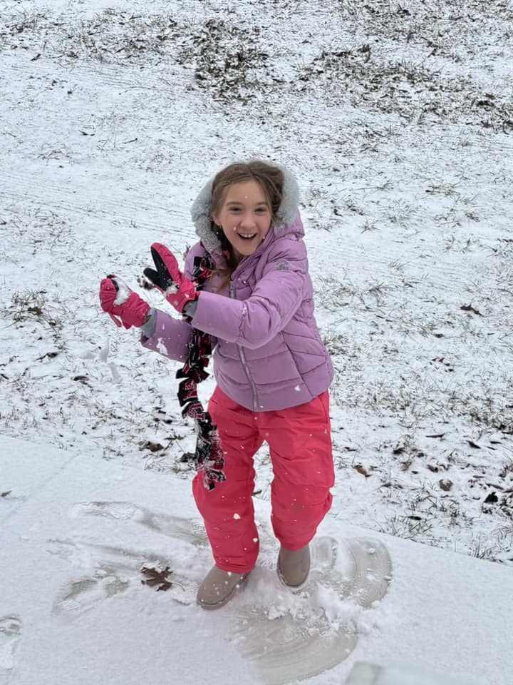 Like many young people in Clay County Audrey Moore waste no time looking for snowball targets.